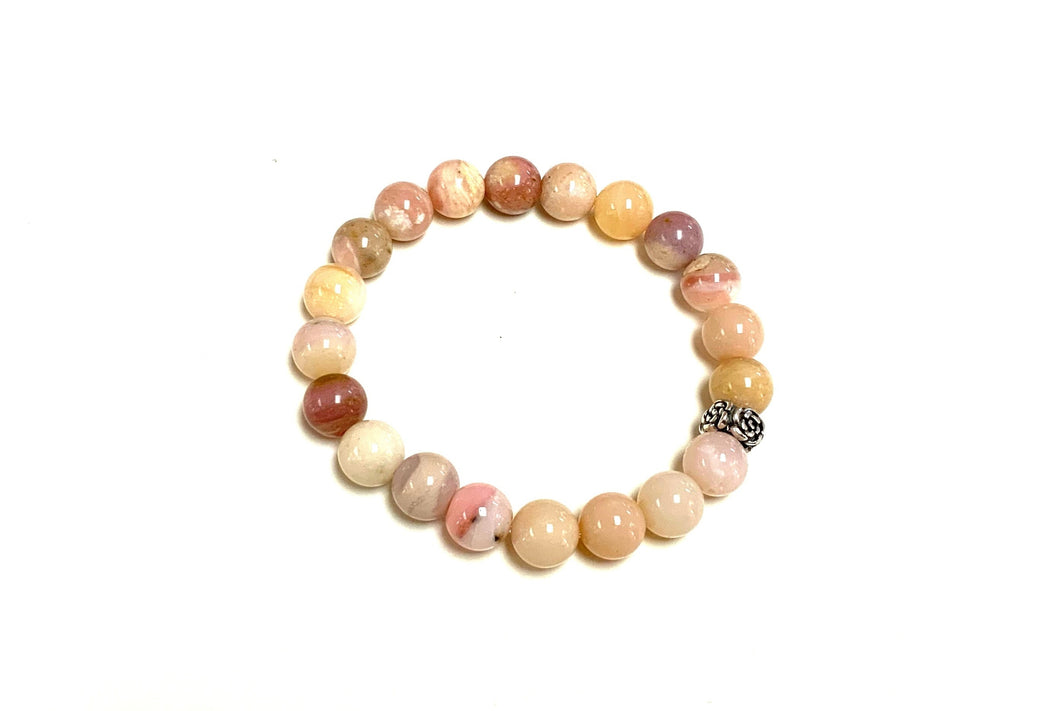 Pink Opal Bracelet. a Bracelet Made of Stones on a Hand from Natural Stone Pink  Opal. Bracelet Made of Natural Stones Stock Image - Image of accessory,  round: 211828419